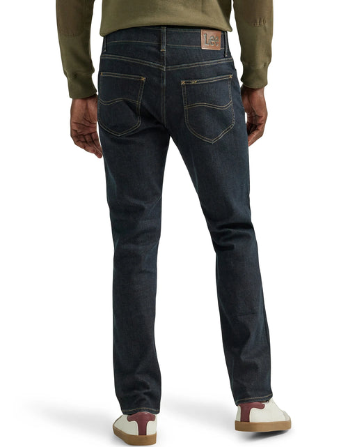 Load image into Gallery viewer, Men’S and Big Men’S Extreme Motion Straight Fit Tapered Leg Jeans
